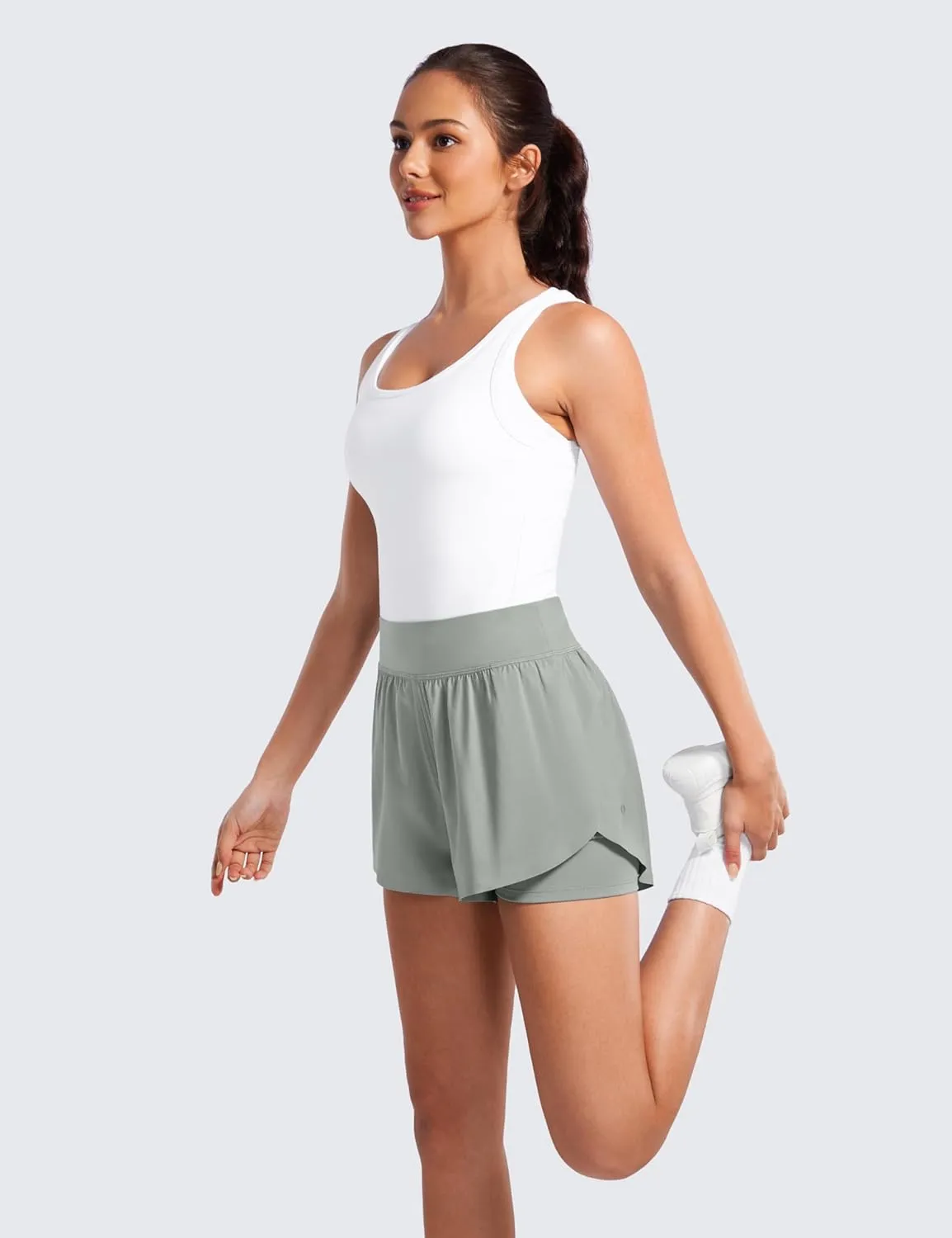 CRZ YOGA 2 in 1 Dolphin Running Shorts for Women High Waisted Gym Workout Athletic Tennis Shorts with Pockets Split